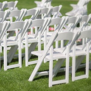 Variety of event chairs set up for an outdoor wedding in Largo, Florida